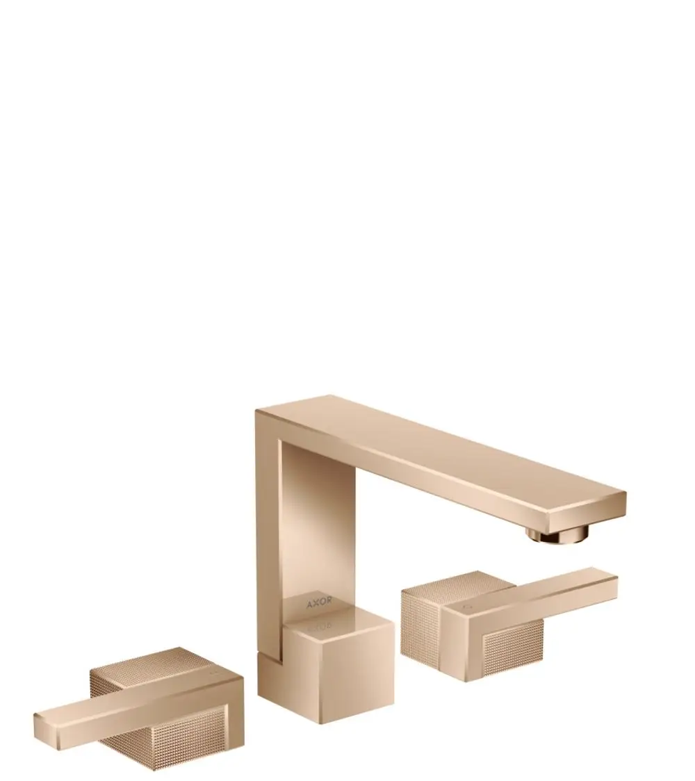 Waschtischarmatur von AXOR mit drei Komponenten. Die Armatur hat eine hohe, gerade Ausführung in Polished Red Gold und eine integrierte Push-Open Ablaufgarnitur.